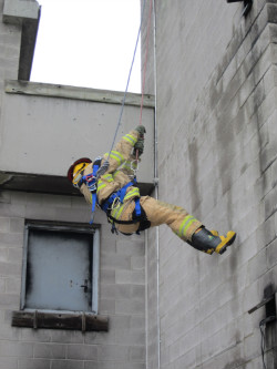 Executive Program participant repelling