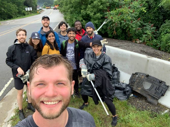 The Waubuno Creek cleanup crew taking a break between filling garbage bags.