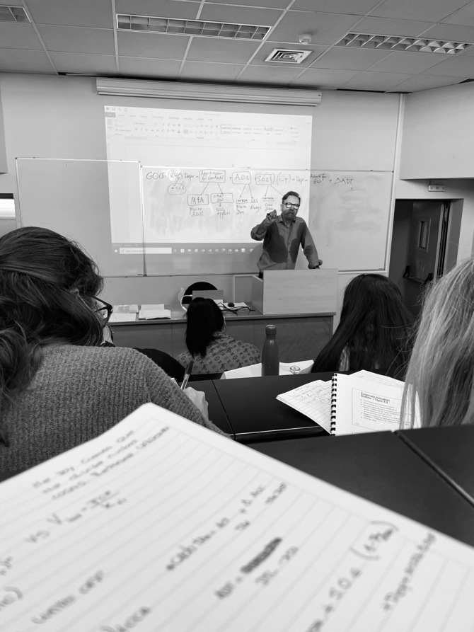 George Athanassakos presenting to students in the Graduate MSc Program in Risk Management at the University of Athens in Athens, Greece