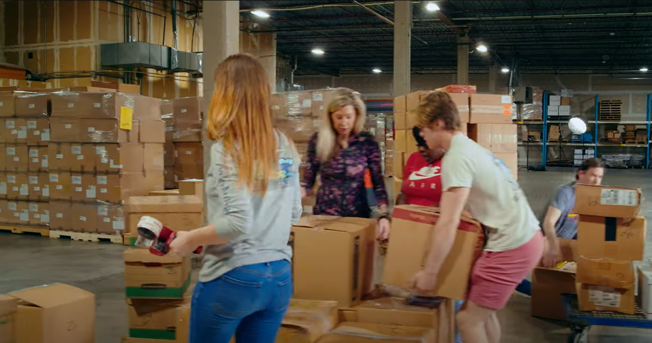 Image: Team at Saint Louis University taping up the boxes for shipment to Pakistan