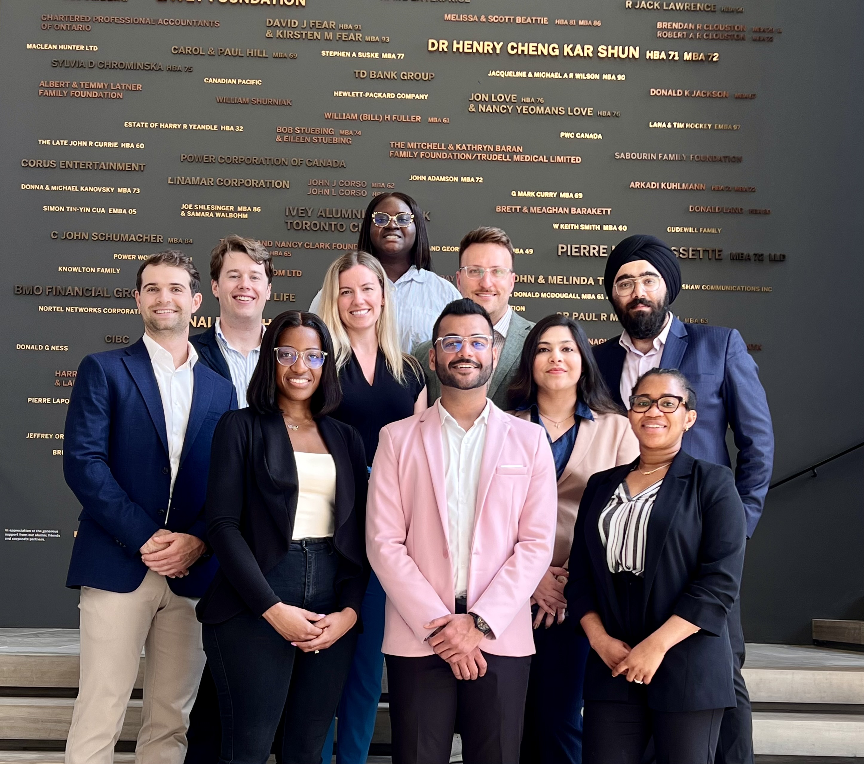 Ivey MBA Association members posing for a photo