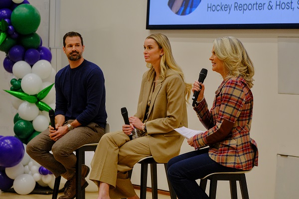 Meghan Chayka (centre)