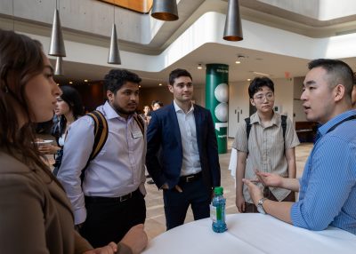 Students networking in Lobby
